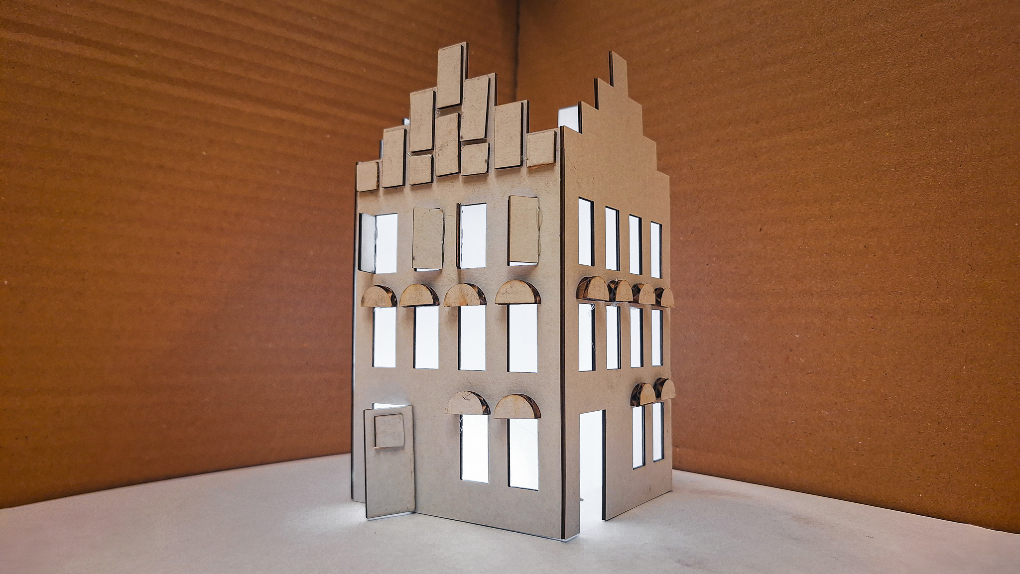 Maak een kartonnen winterhuis